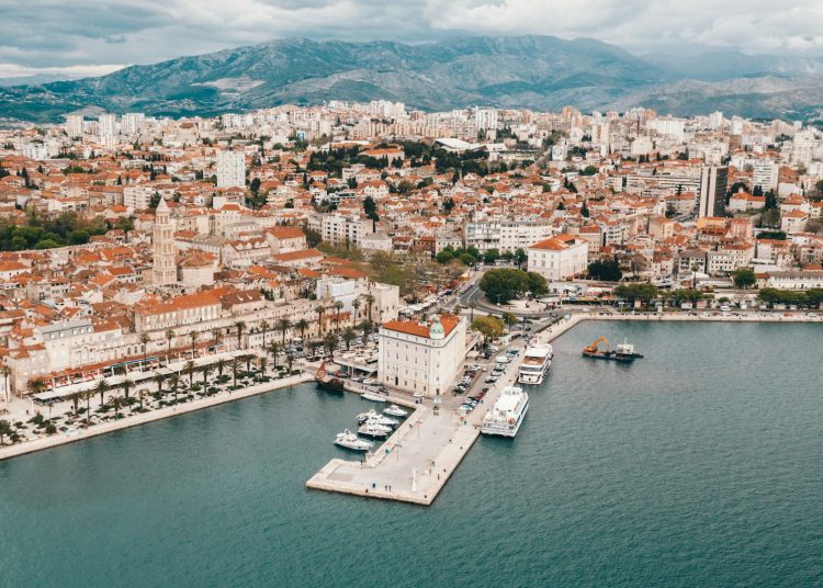 aerial view of building near body of water